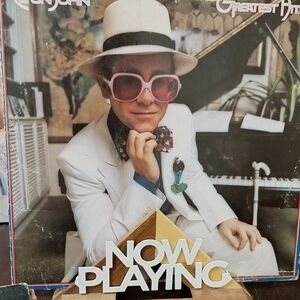 White Suit with Pink Sunglasses